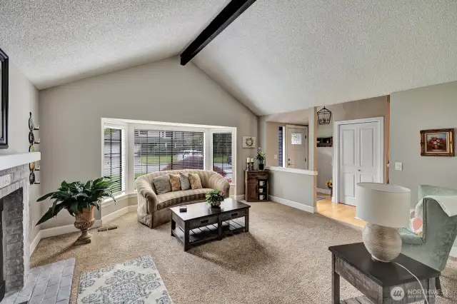 Light filled Formal Living  room with vaulted ceiling to enjoy.