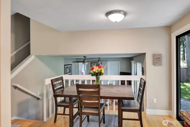 Breakfast Nook overlooking familyroom with doors exiting to a private peaceful back yard patio.