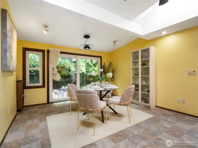 The large dining space in the kitchen allows for a large table and many guests.