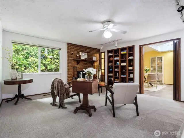 Curl up in front of the wood fire place with a good book in the family room. Fresh paint and carpet.