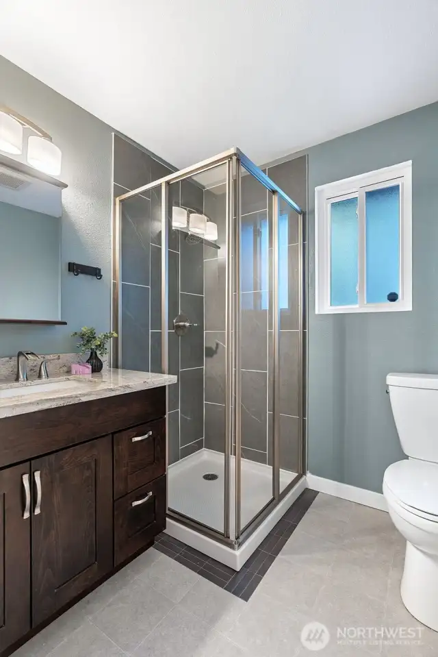 New tile shower & floor, fresh paint and granite topped vanity