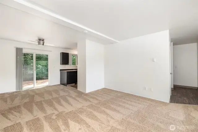 Open main living room flows into the dining room.
