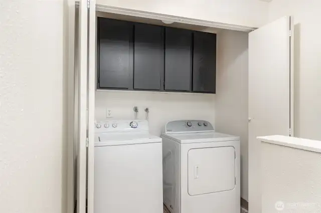 Conveniently located upstairs laundry area for easy access and efficiency.
