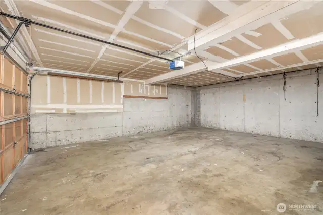 Spacious garage for parking and additional storage.
