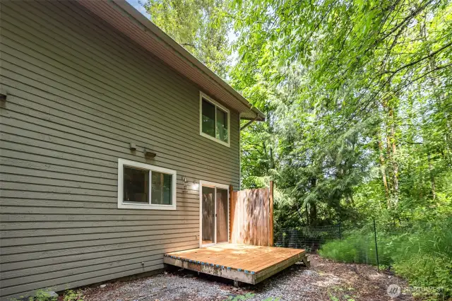 Backyard features a cozy deck and endless potential—ready for your personal touch and outdoor vision.