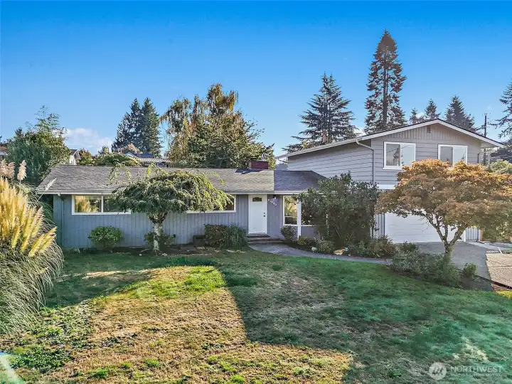 Mature landscaping in the big front yard and lots of parking too!