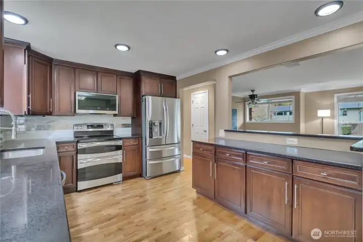 Spacious kitchen with granite countertops,  includes all of your needed appliances