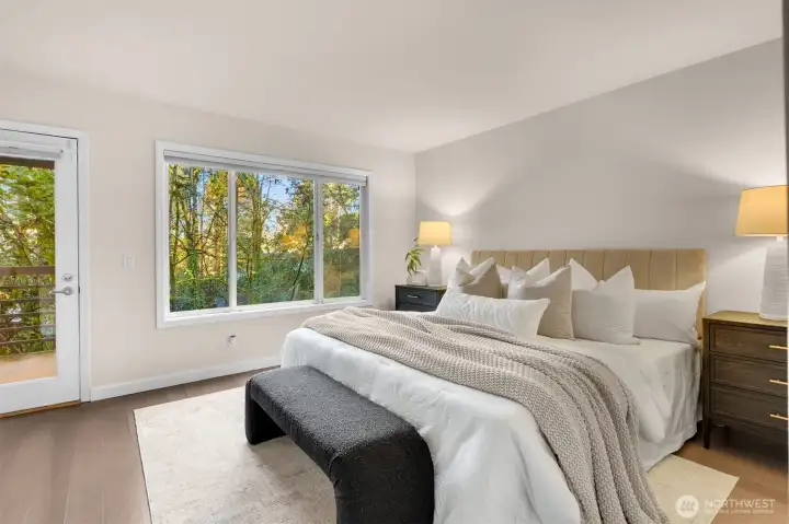 Primary with private access to one of the balconies.