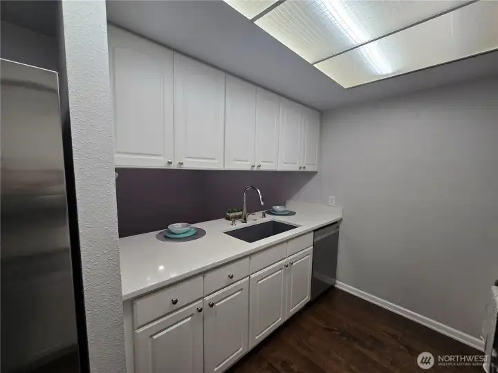 Pass thru into dining room, new dishwasher, refrigerator