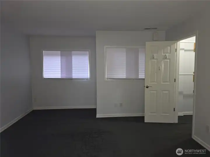 Primary bedroom with attached bathroom