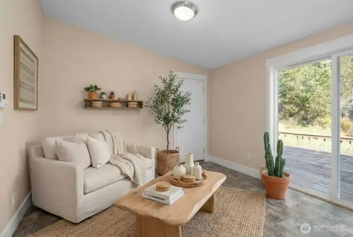 A virtual representation of one of the many ways this additional space can be utilized - this in the way of a lounge space facing your tranquil outdoor space. Tons of natural light.