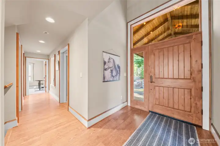Beautiful entry door. Mud room to left with it's own side entrance and built in storage bench.