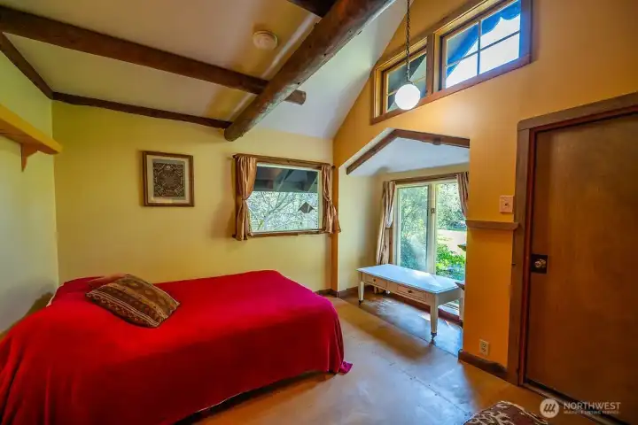 Primary bedroom with loft space