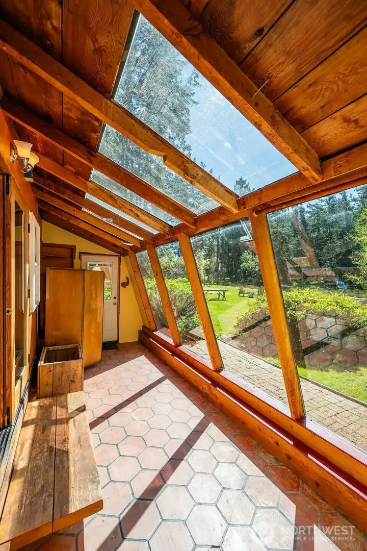 Greenhouse and patio of main house