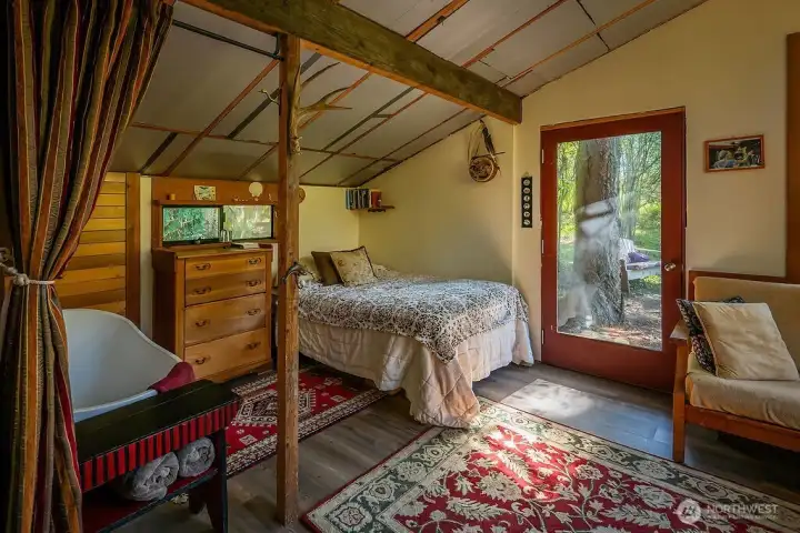 Studio tub and sleeping area
