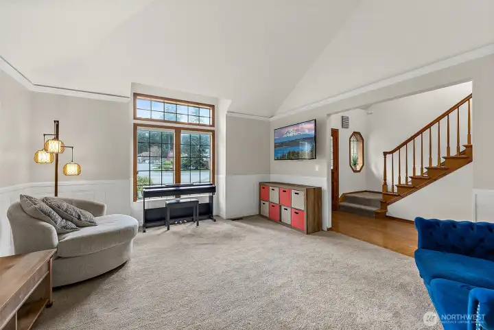 Beautiful wainscoting and vaulted ceilings compliment this space