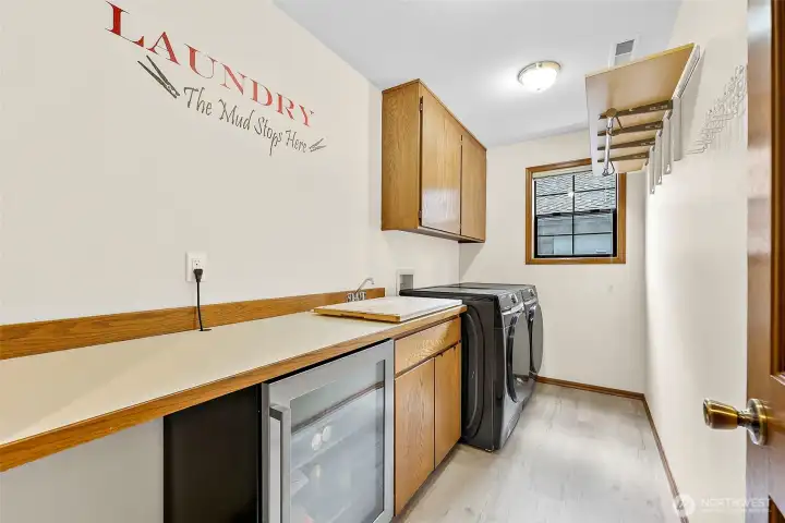 Utility room with beverage fridge