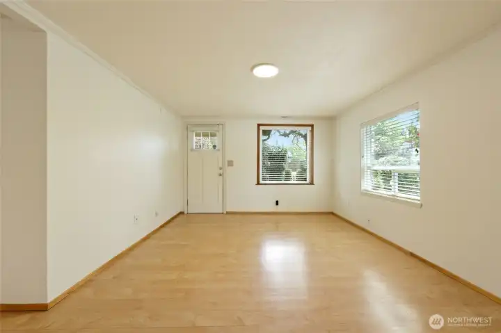Living room with laminate flooring.