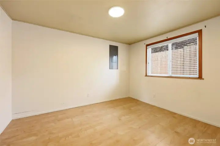 Guest bedroom #2 with laminate flooring.