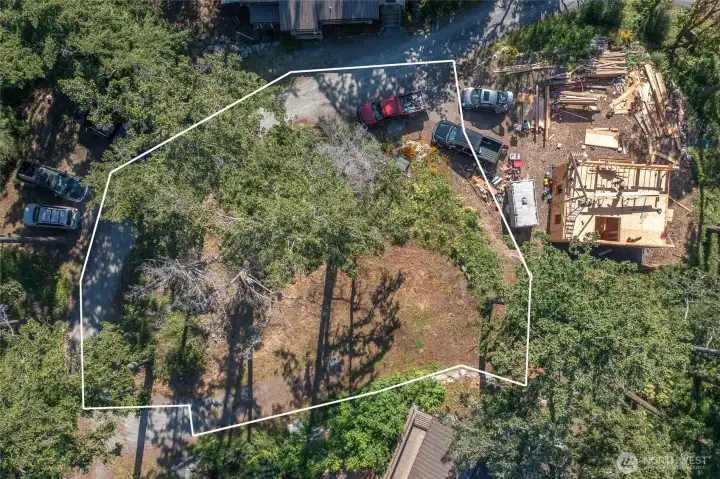 The parcel is tucked within a newly developed neighborhood of 6 lots. The adjacent homes are in place.