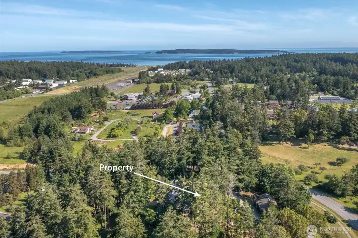 Close to all amenities including the airport, library, performing arts center, restaurants, and grocery stores.