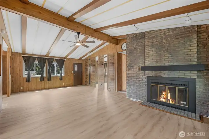 Living rm with wood burn fireplace. Living rm with wood burn fireplace.