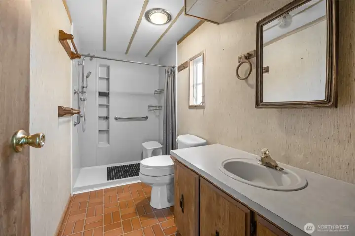 Primary bathrm with newer walkin shower. Primary bathrm with newer walkin shower.