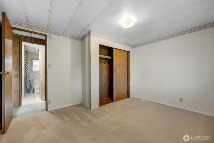 Second bedrm with view of closet and hall bathroom. Second bedrm with view of closet and hall bathroom.