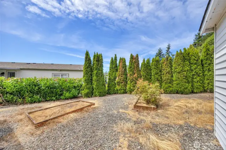 Back yard with raised beds for flower or vegie gardening. Back yard with raised beds for flower or vegie gardening.