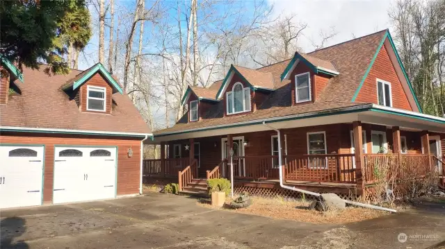 Tons of parking, unseen on the right is a side driveway that leads to the gated entry to the RV parking area.