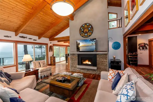 Living room opens to deck and dining room