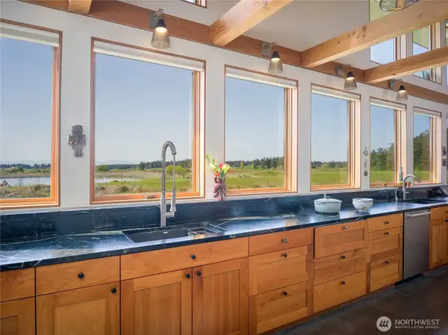 Soapstone counters and Shaker style cherry cabinets.