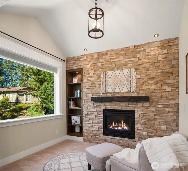 Your own private, fireside sanctuary accented by natural wood & stone finishes.
