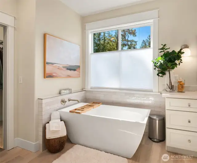 Soak your cares away in the freestanding tub with tile surround.