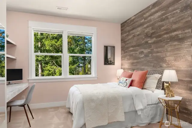 The 3rd bedroom features custom built-ins.