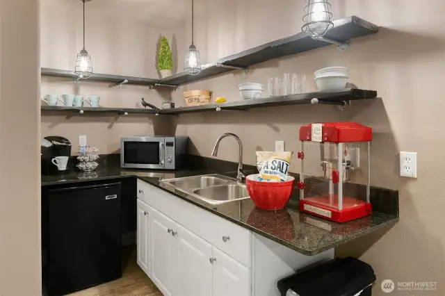 The media room also includes its own kitchenette.
