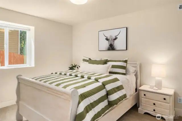 A 5th bedroom on the lower level is perfect for guests.