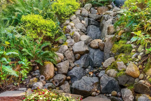 Relax by the soothing sounds of your own backyard water feature.