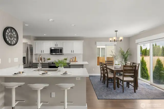 Partial view of the kitchen and the large dining area