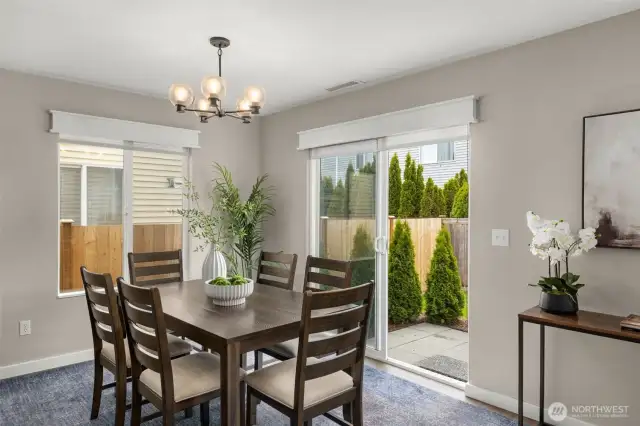 View of the dining area and the backyard behind.