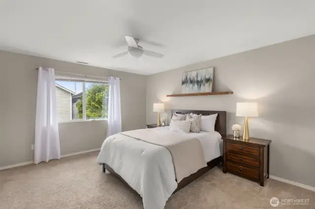 Beautiful primary bedroom upstairs is your haven after a long day!