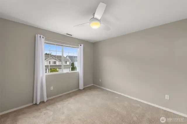 1st secondary bedroom is large and bright.