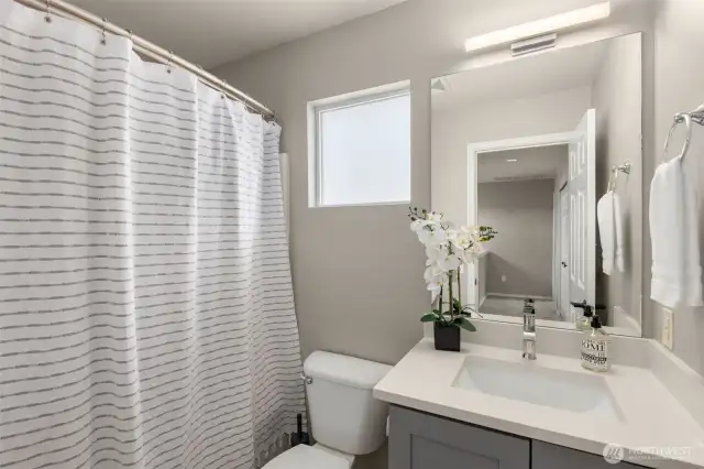 A full hall bath upstairs is also updated and has a shower and bathtub