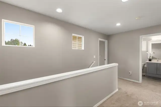 Windows bring in a lot of light in the upstairs hallway!