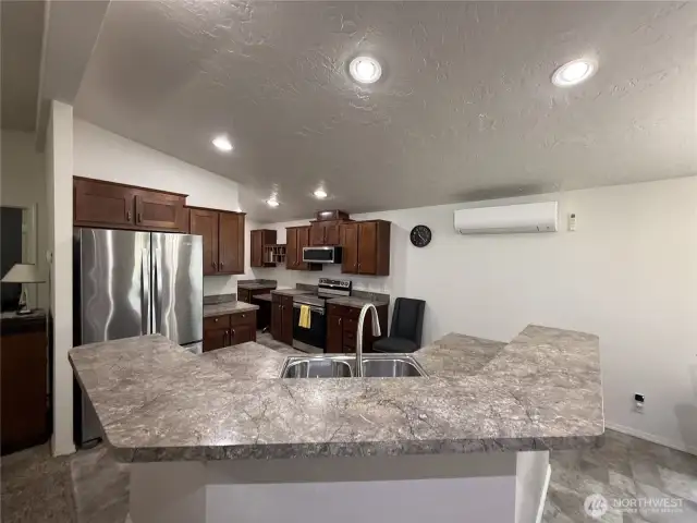 Kitchen looks new.