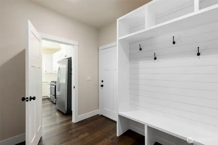 Drop zone with custom built bench and storage space. Drop zone with custom built bench and storage space.