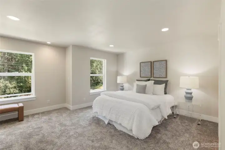 Primary bedroom with mini-split to provide year round comfort. Primary bedroom with mini-split to provide year round comfort.