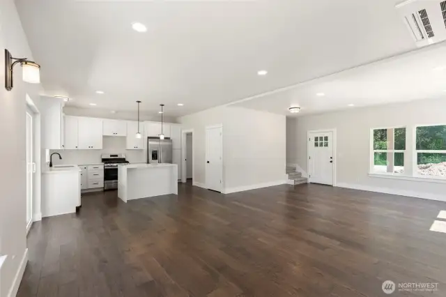 Seamless flow from living space to dining room to kitchen.  Great space to entertain.