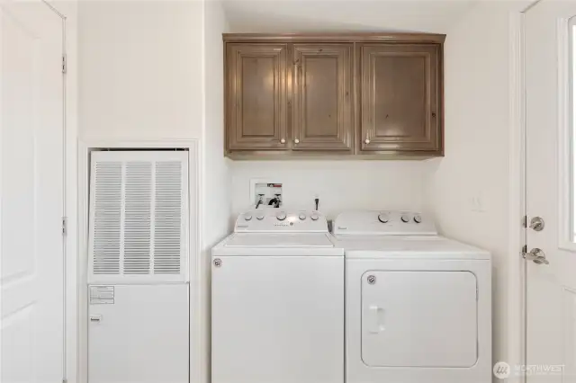 Off the kitchen is the laundry / utility room with outdoor access.