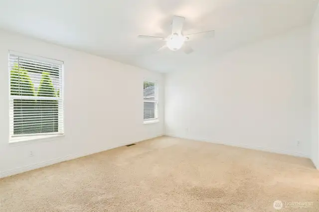 Large Primary bedroom en suite with walk-in closet.